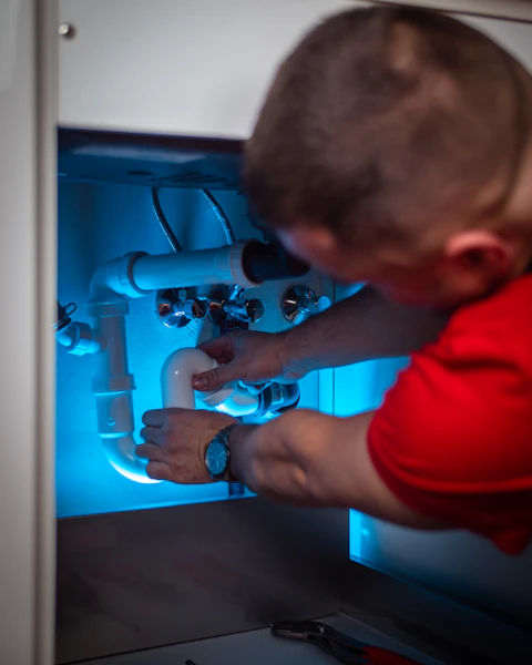 Plumber on a job site
